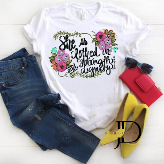 She is clothed in Strength & Dignity T-Shirt